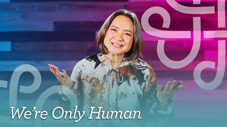 Sarah Do has her hands out open above the title, "We're Only Human".